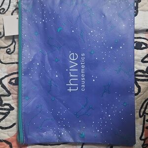 Thrive Causemetics Vibrant Blue Makeup Pouch